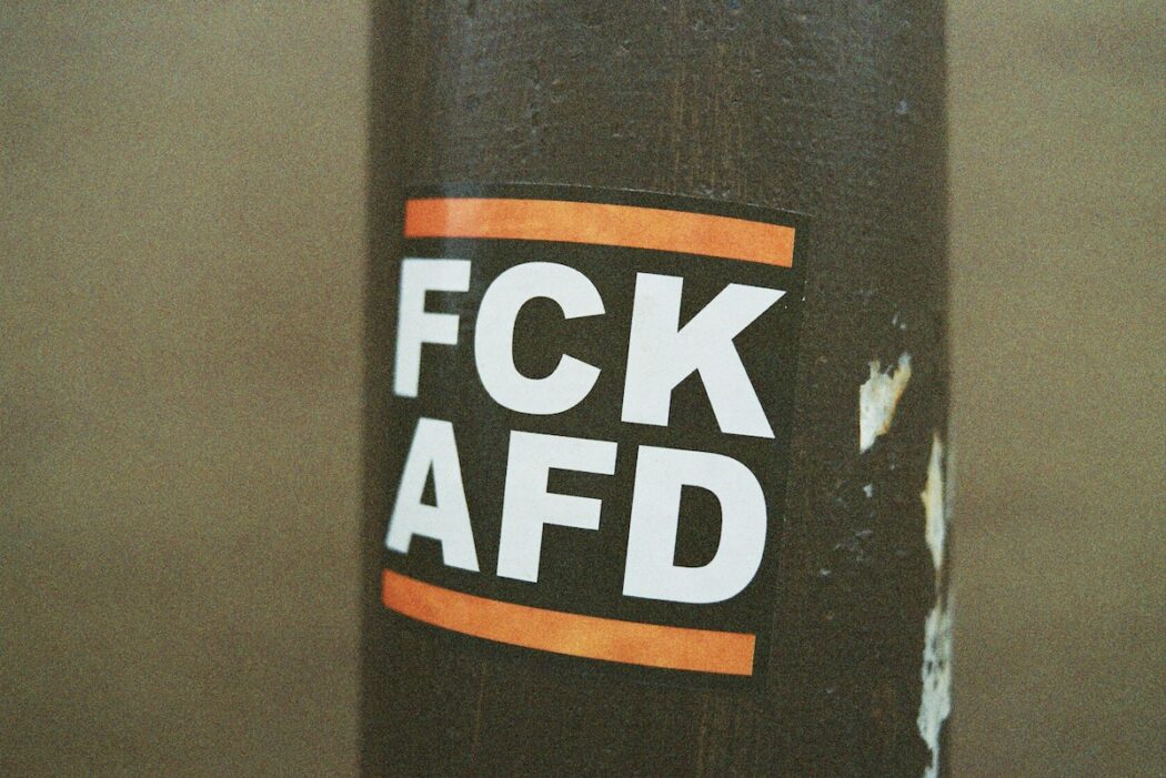 sticker on sign saying FCK AFD